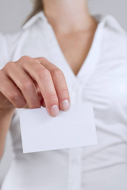 istock Woman Holding Business Card 167240060