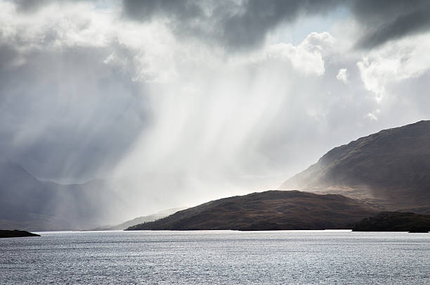 istock Back lit Rainstorm over Loch Assynt 167240117