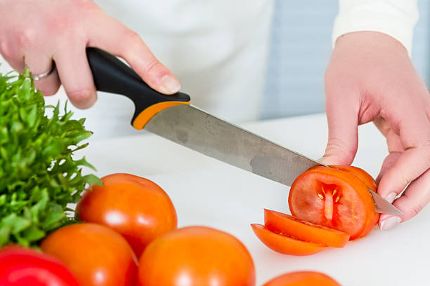 istock Chopping Tomato to a Healthy Salad 167243043