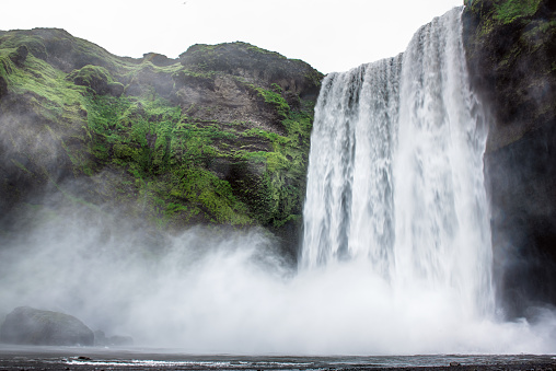 Scogafoss waterfall in Iceland. Travel summer nordic concept. Natural icelandic background.