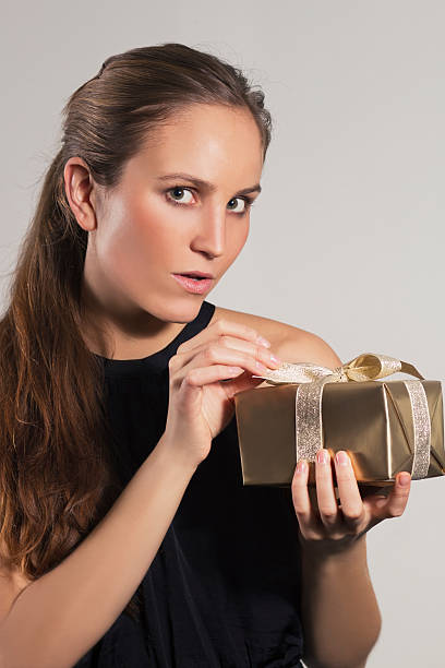 istock Woman Open Christmas Gift 167244274