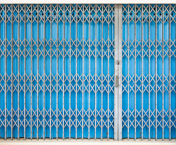 istock Closed Shutters in a commercial Shop 167244558