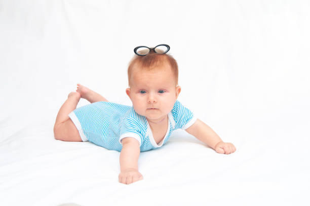 istock Cute baby with glasses 1672446825