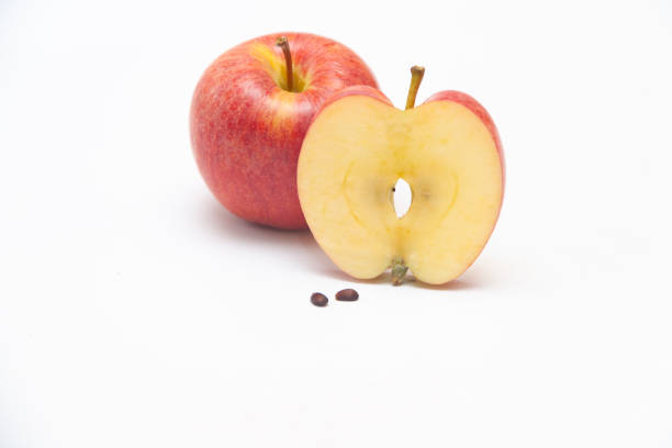 A collection of fresh red apples positioned on a clean white background, showcasing their glossy skins and natural allure. The variety and arrangement emphasize health and nutrition, symbolizing freshness and vitality. Perfect for use in food, diet, or healthy lifestyle-related visual contexts.