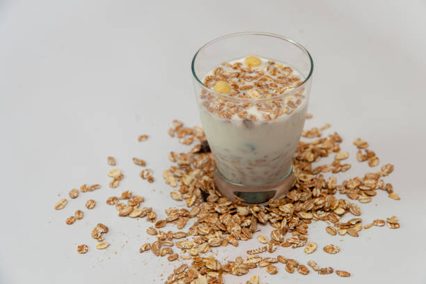 Glass with milk and muesli.