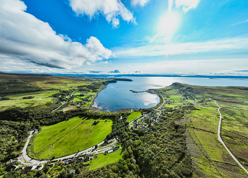 Drone view over the bay of Uig village on the Isle of Skye, Scotland