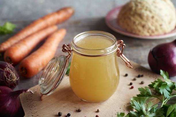 istock A glass jar of chicken bone broth or soup 1672502362