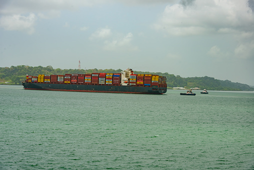 Container ship on Gatun lake transiting the Panama canal
