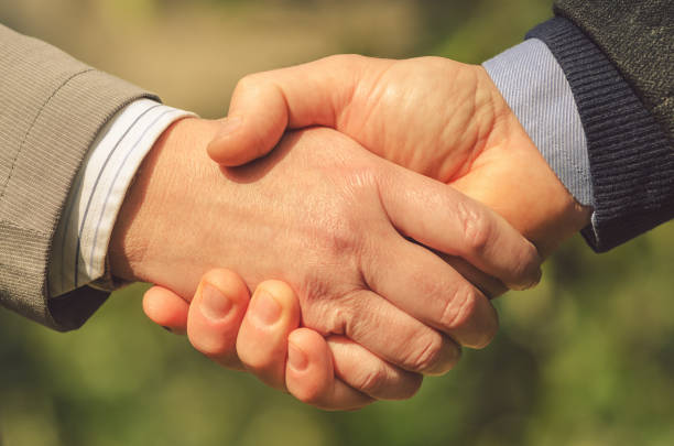 istock Business handshake outdoors 167251349