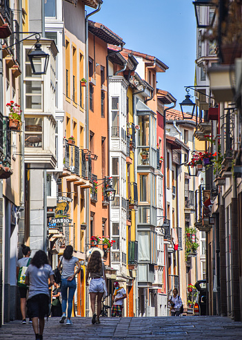 Vitoria-Gasteiz, Spain - 20 August 2021: Colorful buildings in the narrow streets of old town Vitoria Gasteiz