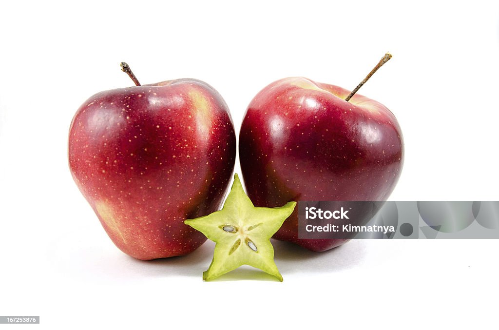 Due mele rosse con carambola - Foto stock royalty-free di A forma di stella