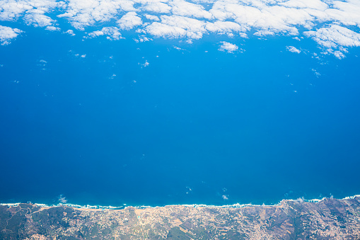 Description: Aerial view of the ocean, coastline and mainland Portugal. Madeira, Portugal, Europe.