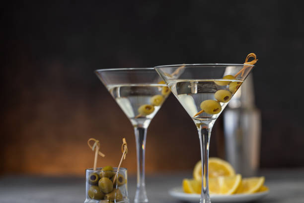 istock Two glasses of martini with olives 1672571948