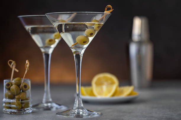 istock Two glasses of martini with olives 1672572485