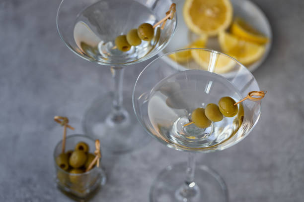 istock Two glasses of martini with olives 1672577400