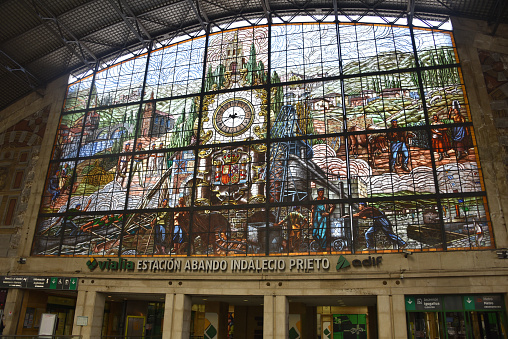 Bilbao, Spain - 22 April 2022: Stain Glass window in the Abando Train Station, Bilbao, Spain