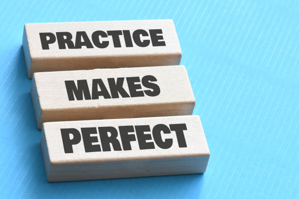 istock Practice makes perfect symbol. Concept words Practice makes perfect on wooden block. 1672584660