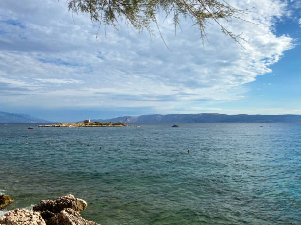 istock Afternoon in croatian beach 1672598527