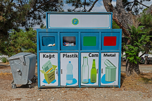 Paper, plastic, glass, metal recycling waste bin.