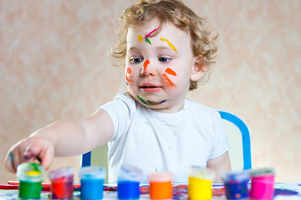 istock Cute little child painting 167272652