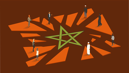 Illustrated people stand on the pieces of a shattered Moroccan flag, illustrating a difficult time in the nation, such as the aftermath of the 2023 earthquake (or anything else leaving the people of Morocco feeling broken). The green pentagram or star in the center of the flag remains unbroken. Bright red shards contrast with a deep red background, presented on a 16x9 artboard.