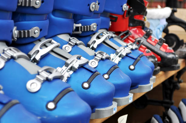 A row of rental ski boots
