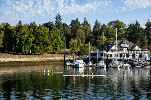 Canoeing at Stanley Park  on a sunny autumn afternoon. Royal Vancouver Yacht Club in the background.