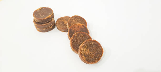 istock The palm sugar or Jaggery on white background 1672847434