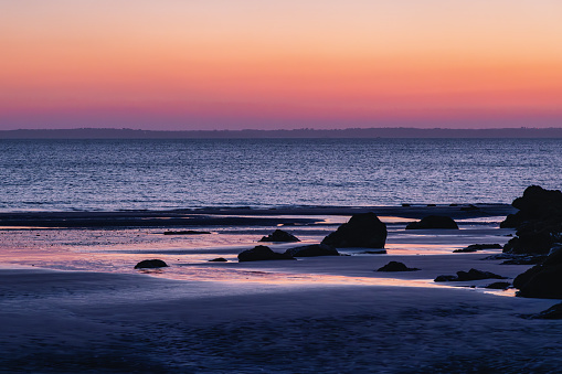 picture of a beach on the Crozon peninsula in Brittany, France, at sunset