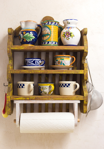 Rustic Kitchen: Small Shelves with Cups, Pitchers, Paper Towels