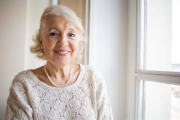 istock Happy senior woman 1672861223