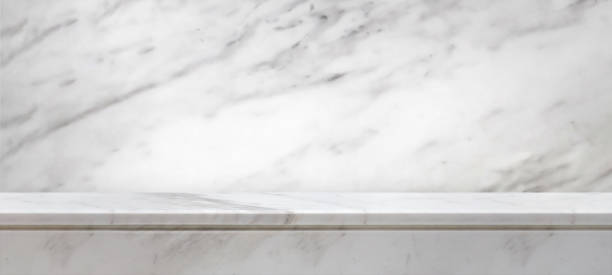 istock white marble table top with natural wall texture background for mockup product display template 1672864975