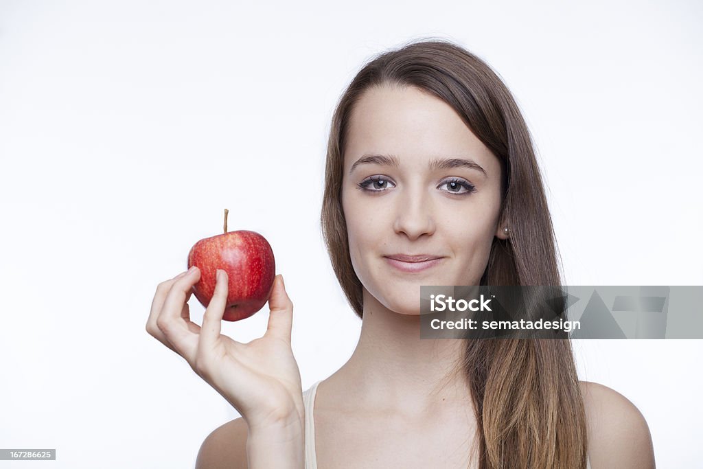Zdrowy tryb życia. Piękne brunette trzyma Jabłko - Zbiór zdjęć royalty-free (20-29 lat)