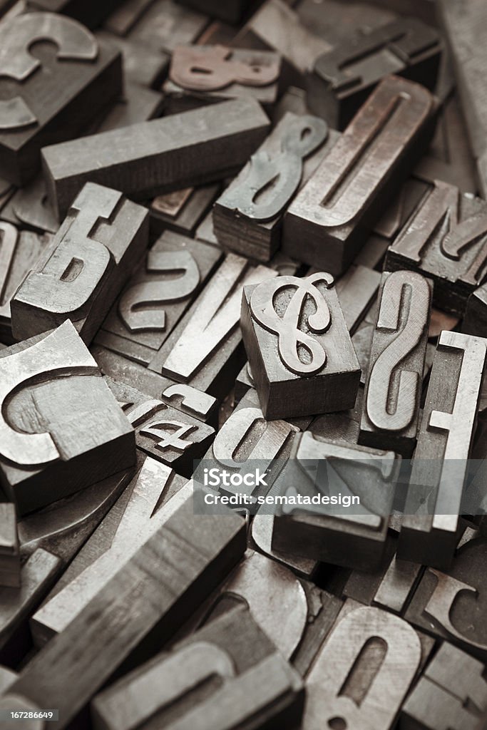 Letterpress Old wood letterpress letters background. Alphabet Stock Photo