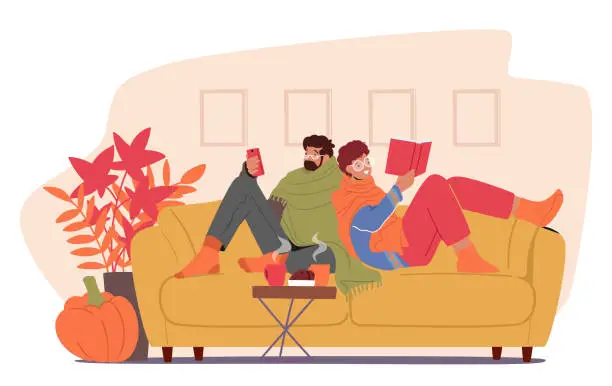 Vector illustration of Content Couple Snuggled On The Couch, Engrossed In A Book And Phone, Basking In The Warmth Of Autumn Hues