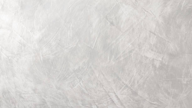 istock Grunge concrete cement wall. Grey cement concrete texture wall background 1672931450