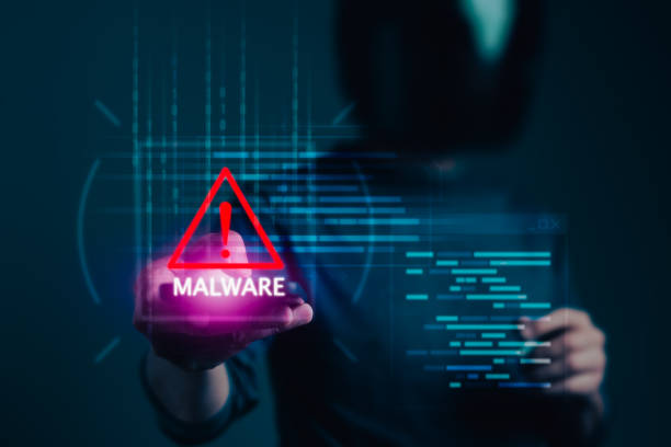 istock Digital Peril, Hacker's Finger Points to Cyber Virus Attack Avenues on Virtual Screen 1672931961