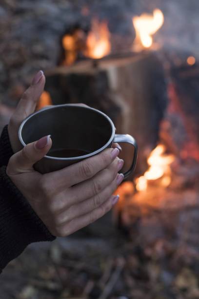istock relaxation in nature with tea and coffee 1672992444
