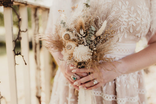 Boho wedding flowers and dress