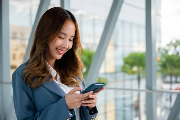 istock Female hands typing message on smartphone 1673055633