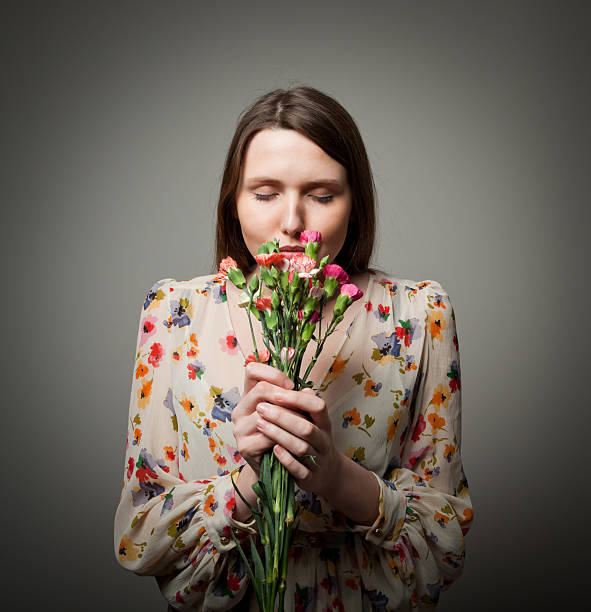 istock Girl with flowers 167306956