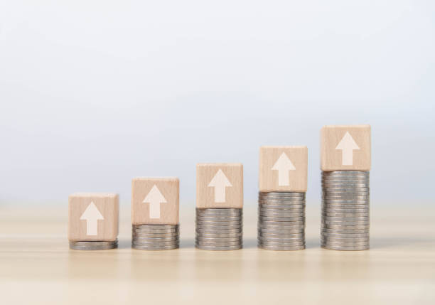 istock Up arrow and coin 1673183561