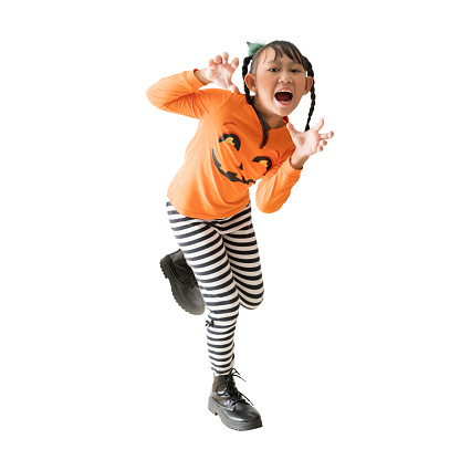 Happy Asian child girl wear Halloween costume standing posing full body portrait, isolated on white, Clipping Paths for design work