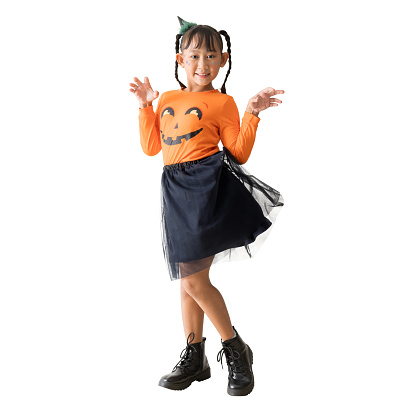 Happy laughing asian child girl wear Halloween costume standing posing full body portrait, isolated on white background, cipping Paths for design work