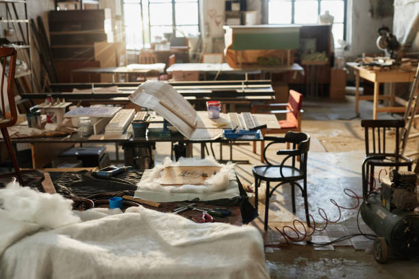 istock Furniture restoration workshop lit by sun rays 1673333003
