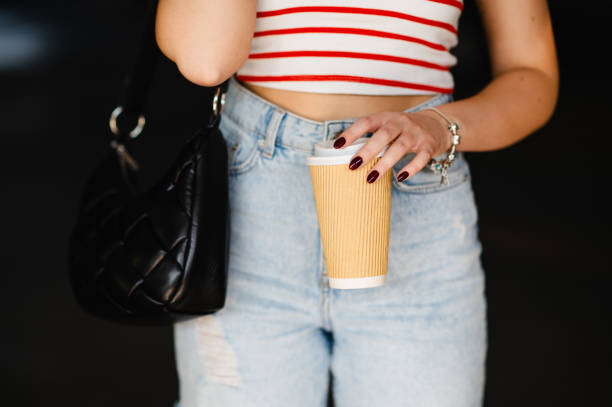 istock Young woman coffee mug 1673334131