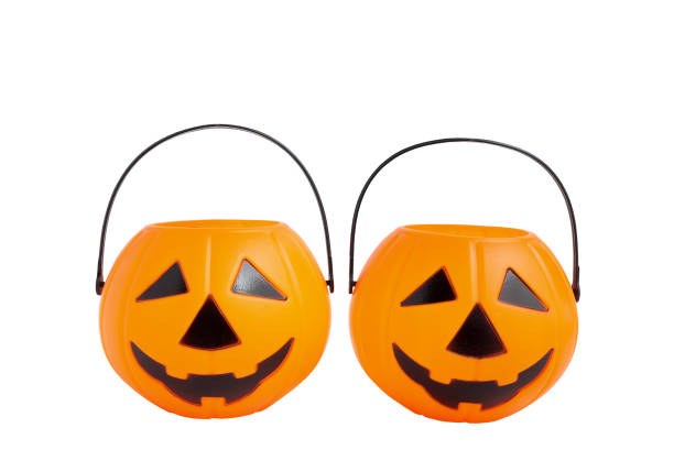 istock Jack'O pumpkin basket. scary halloween's plastic pumpkin isolated on white background with clipping path. 1673357788