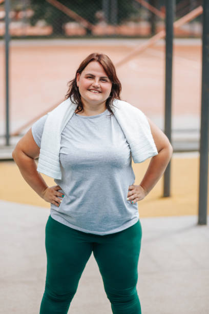 istock Happiness and Confidence Plus Size Woman's Joyful Portrait After Training 1673363812