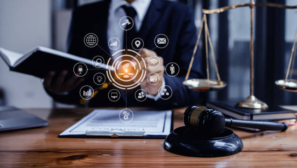 istock Lawyer hands with law network interface icons. 1673368613