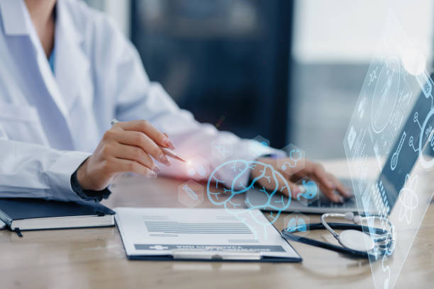 istock Doctor using laptop computer with medical medical network connection icons. 1673369663